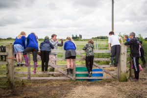 open farm day Yorkshire-documentary photography showing education talk from farmer