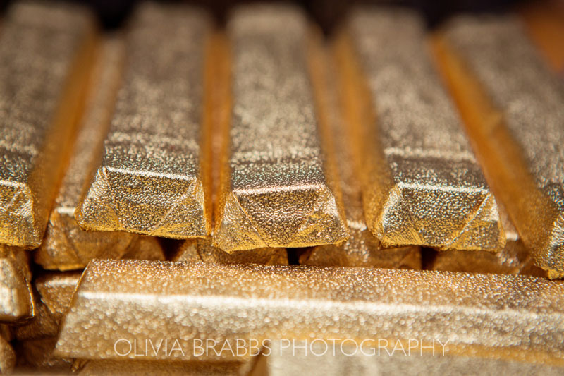 gold wrapped chocolate bars in production in the factory