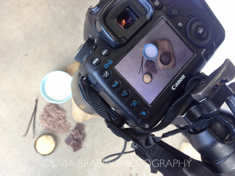 view of food photography flat lay set up from back of Canon 5D camera during commercial shoot