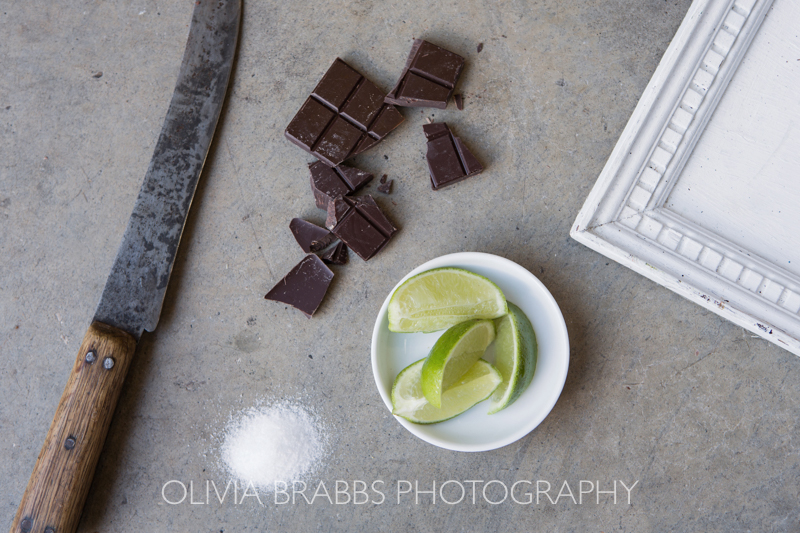 flay lay photograph from a commercial shoot for choc affair showing ingredients for salted lime dark chocolate bar