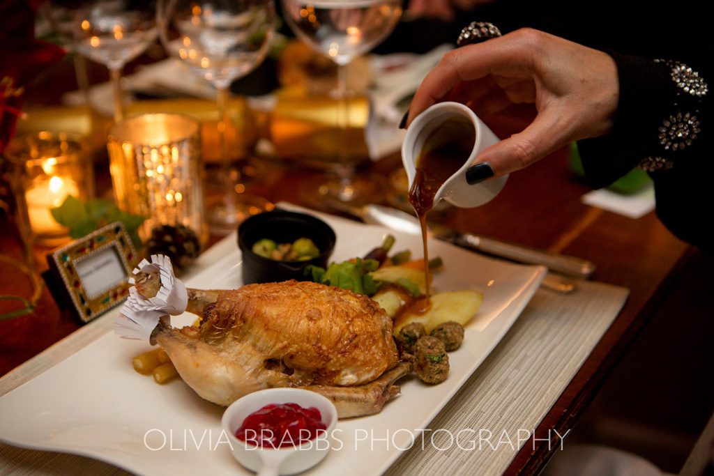 gravy being poured onto christmas meal for dine catering york