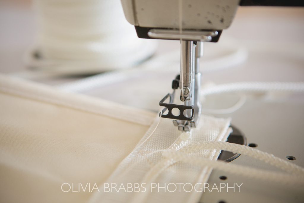 manufacturing photography for wills marquees in yorkshire showing sewing machine in action