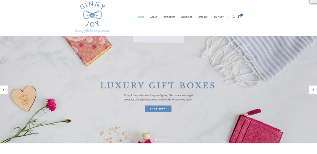 screen shot of client website showing flat lay photography for gift box company