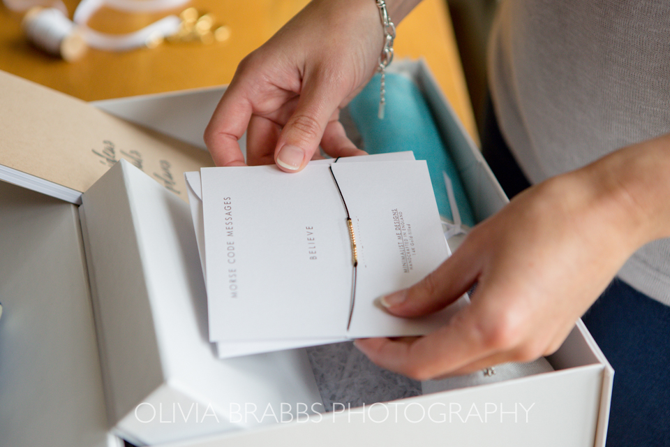 branding photography showing luxury gift boxes being packed by ginny and joy
