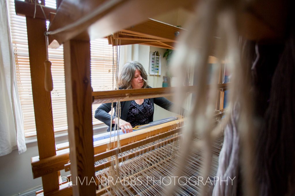 weaver jaqueline jones at work at her loom