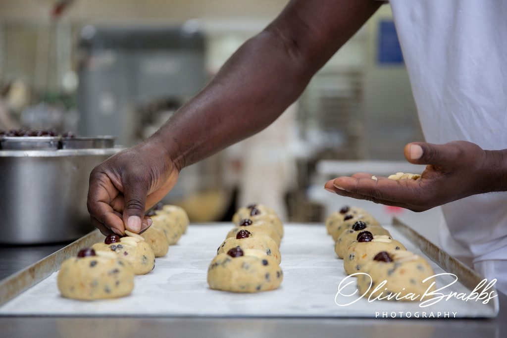 close up production image showing fat rascals being made in the bettys craft bakery in harrogate