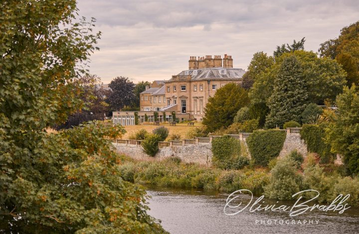 View of Ednam House Hotel on banks of River Tweed in Kelso, Scotland at dusk