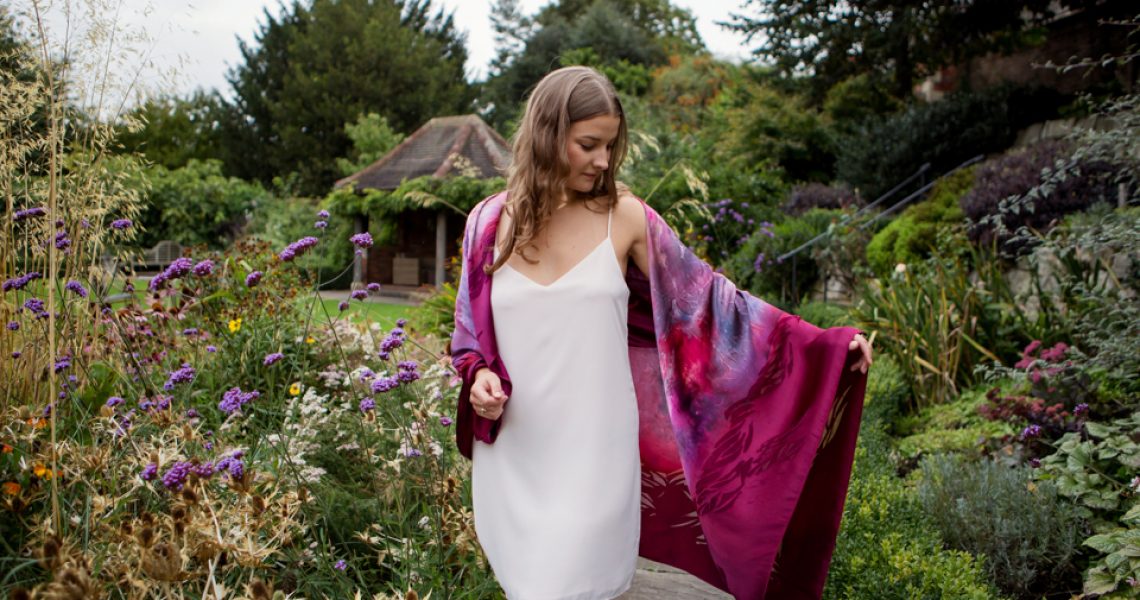 model portrait showcasing meiji designs silk scarf shot in gardens at Grays Court York